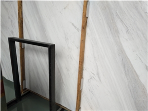 wavy and diagonal thick grey veins white marble 