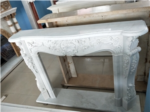 white marble antique sculptured indoor fireplace mantel 