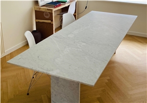 Dining table in Carrara white marble