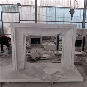 Modern style fireplace in white marble