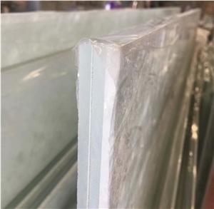 backlit white onyx laminated glass panel