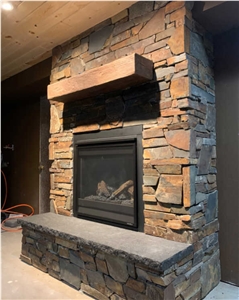 Sandstone Stacked Stone Veneer Fireplace
