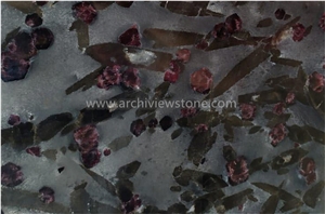 Backlit Ruby Meteorus Night Rose Granite Slabs