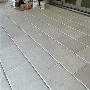 Texas White Limestone Pillowed Edge Floor Tiles