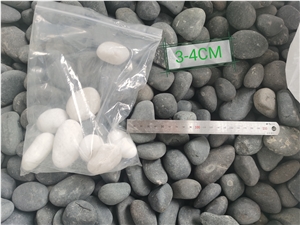 China Orignal Unpolished Grey River Stone Pebbles
