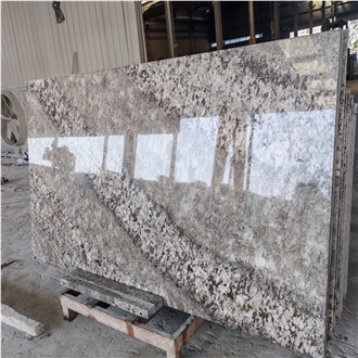 White Torroncino Granite Slabs
