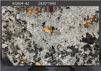 Alaska White Granite Slabs Displaying Complex Dark