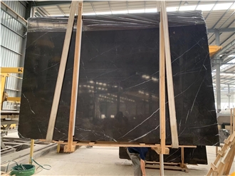 Pietra Grey Marble Tiles Featuring Intertwined Veins