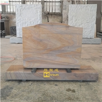 Rainbow Sandstone Headstone Featuring Saddle Top And Serpentine Design